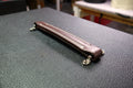 Faux leather handle.