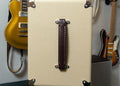 Faux leather handle.
